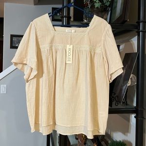 Brand new with tags. Super cute just not my style anymore.